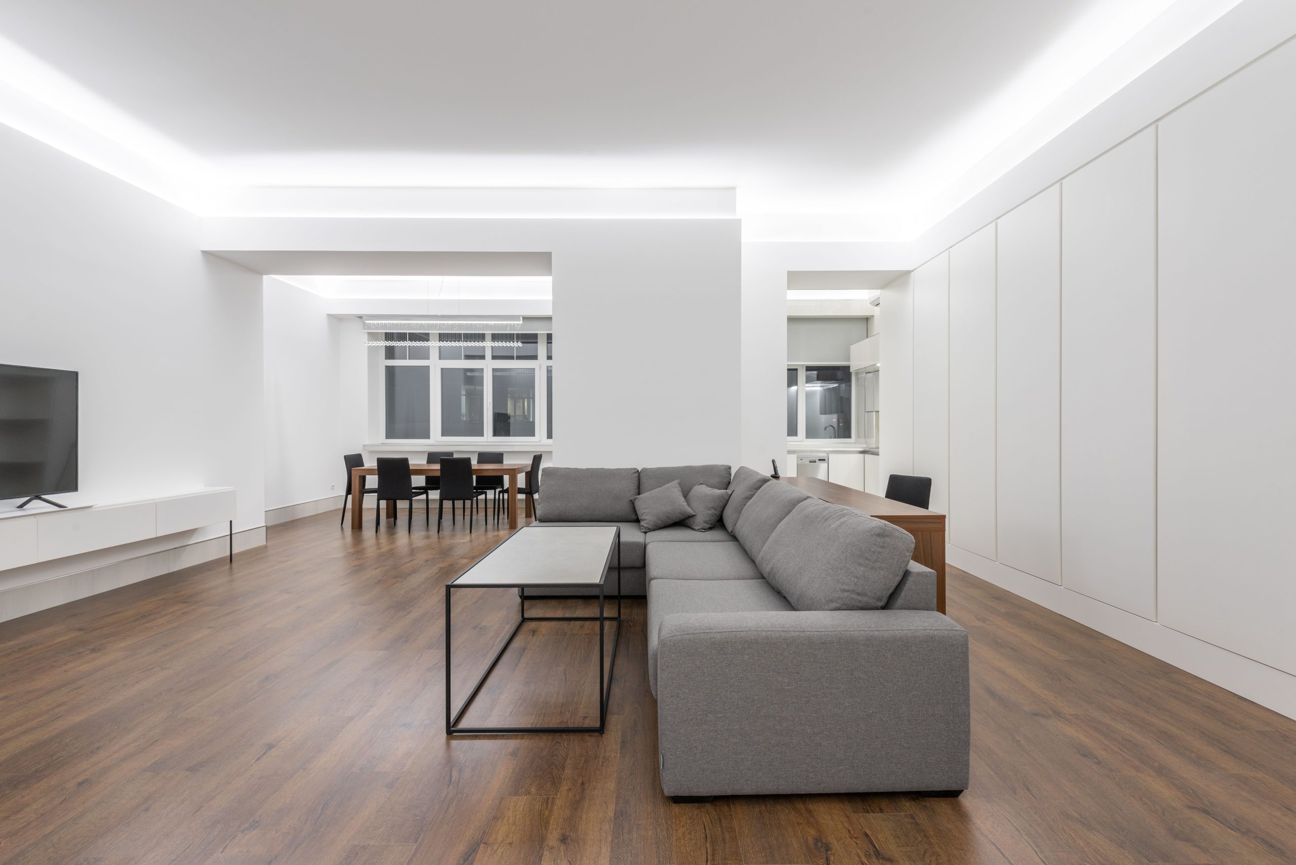 Pale wood-look laminate flooring in an empty Arkansas room